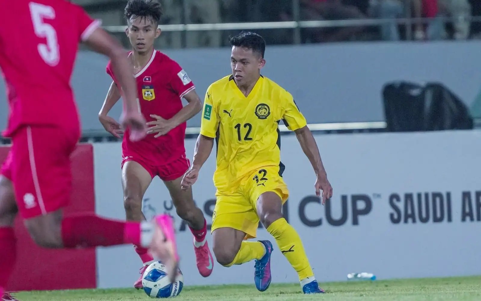 Malaysia Secures Dominant 3-0 Victory Over Laos in Asian Cup Qualifiers Amidst FIFA Naturalization Inquiry
